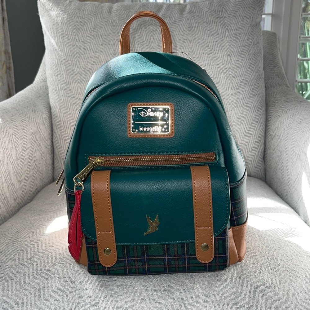 NWT Disney Peter Pan Loungefly! So cute with Tinkerbell and red feather accent.